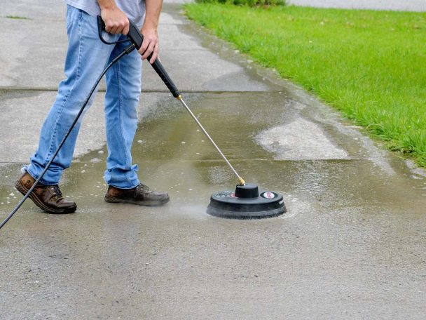 concrete driveway being pressured washed