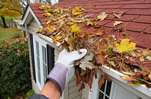 gutter being cleaned
