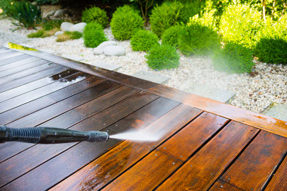 wooden patio porch being pressured washed