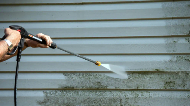 wooden patio porch being pressured washed